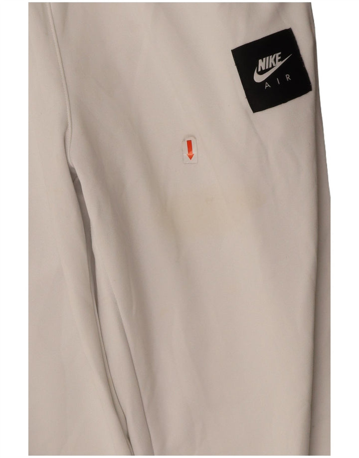 NIKE Womens Tracksuit Trousers Joggers Medium  White Colourblock Polyester