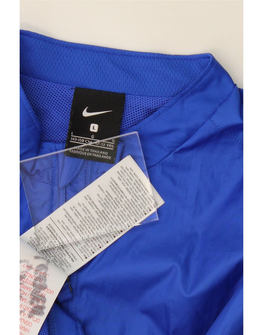 NIKE Boys Rain Jacket 12-13 Years Large Blue Colourblock Polyester Vintage Nike and Second-Hand Nike from Messina Hembry 
