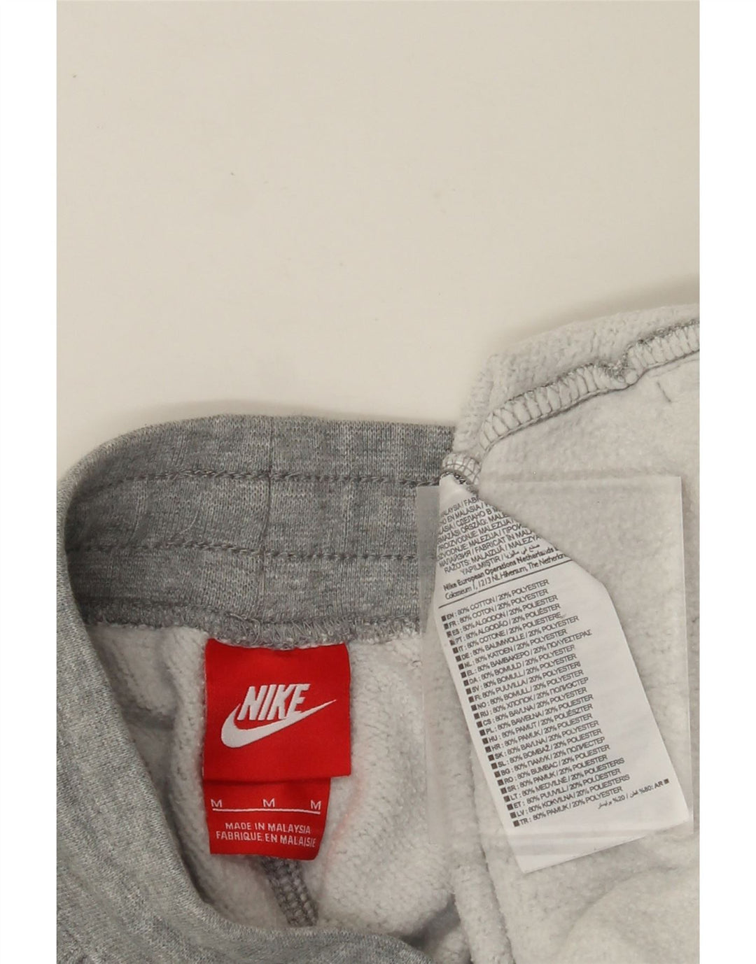 NIKE Womens Graphic Tracksuit Trousers Joggers UK 14 Medium Grey Cotton