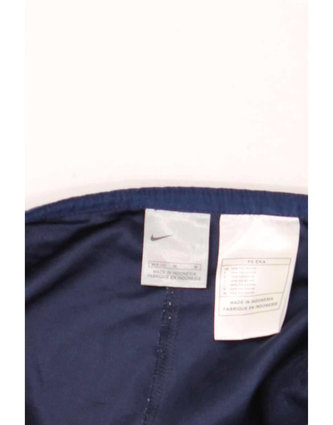 NIKE Womens Tracksuit Trousers US 8/10 Medium  Navy Blue Polyester Vintage Nike and Second-Hand Nike from Messina Hembry 