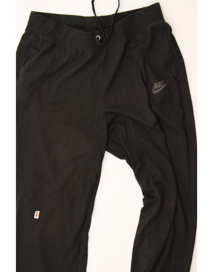 NIKE Womens Tracksuit Trousers Joggers UK 10 Small Black Polyester Vintage Nike and Second-Hand Nike from Messina Hembry 