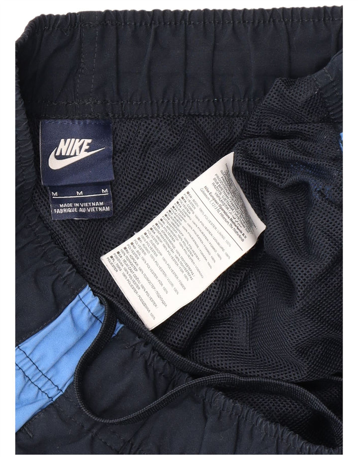 NIKE Mens Tracksuit Trousers Medium Blue Colourblock Polyester Sports