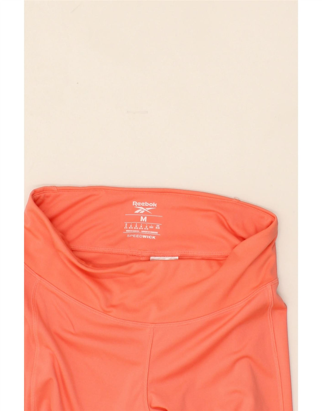 REEBOK Womens Graphic Leggings UK 12/14 Medium Orange Polyester Vintage Reebok and Second-Hand Reebok from Messina Hembry 