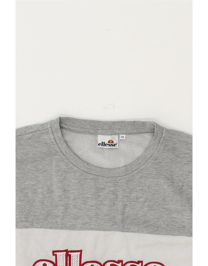 ELLESSE Womens Graphic Sweatshirt Jumper UK 14 Medium Black Colourblock Vintage Ellesse and Second-Hand Ellesse from Messina Hembry 