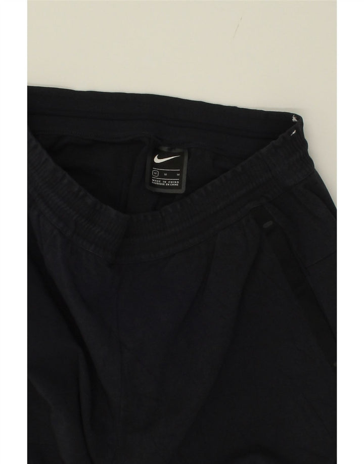 NIKE Mens Tracksuit Trousers Medium  Navy Blue Cotton Vintage Nike and Second-Hand Nike from Messina Hembry 