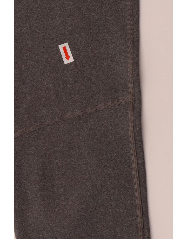 NIKE Girls Dri Fit Graphic Leggings 12-13 Years Large  Grey Colourblock