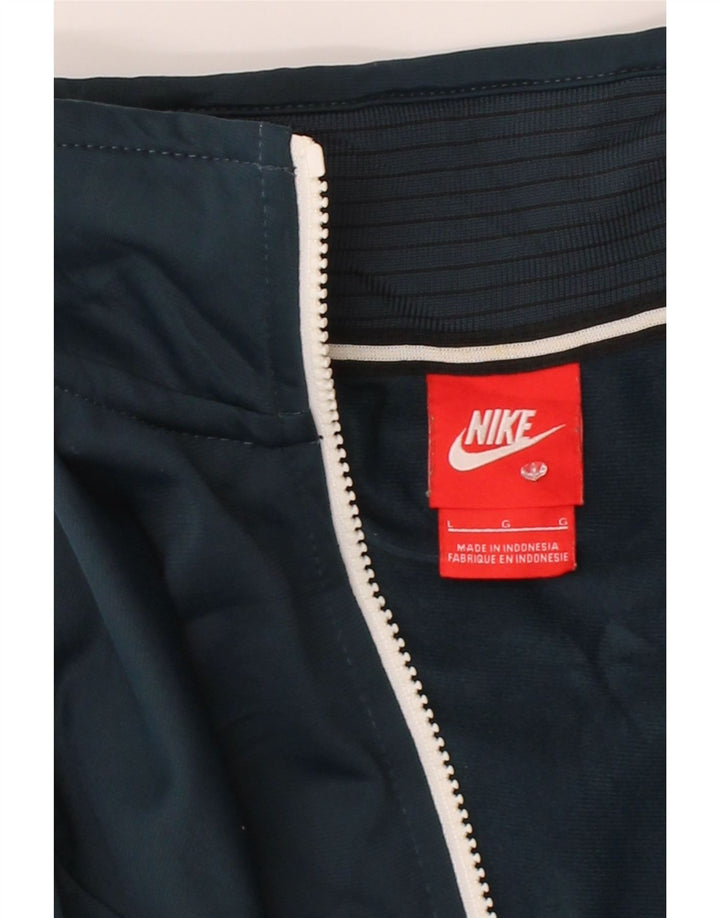 NIKE Womens Tracksuit Top Jacket UK 16 Large Navy Blue Polyester Vintage Nike and Second-Hand Nike from Messina Hembry 